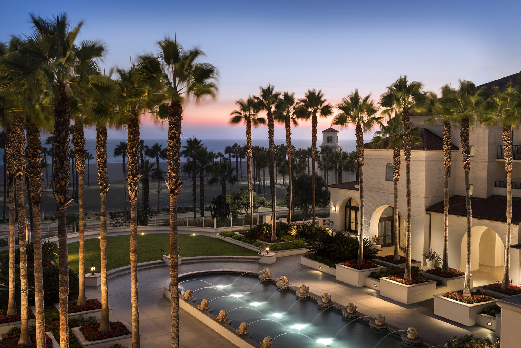 Hyatt Regency Huntington Beach courtyard at dusk